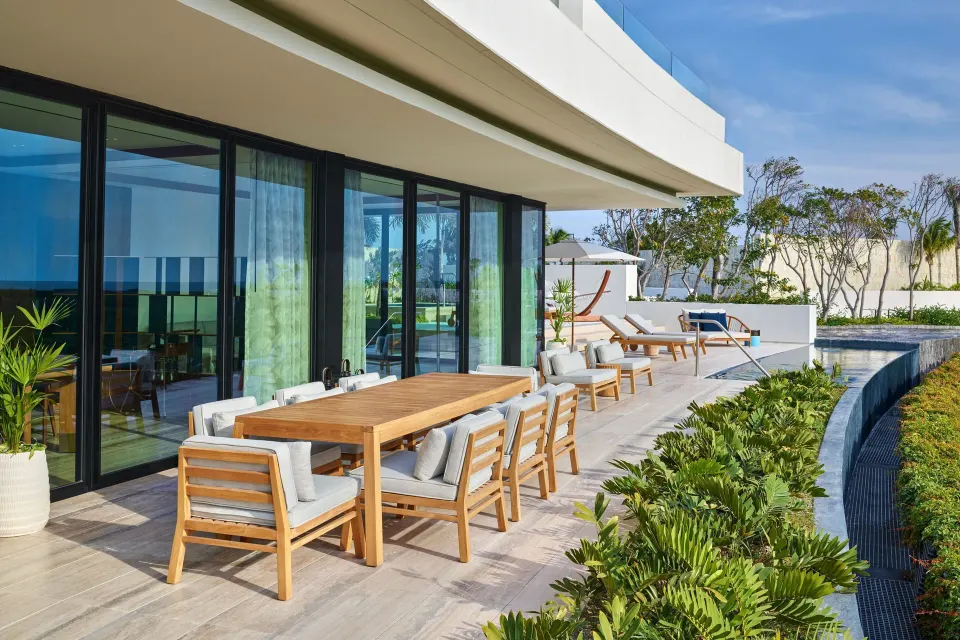 Ocean View Suite terrace with dining table and plunge pool at The St. Regis Kanai Resort, Riviera Maya.