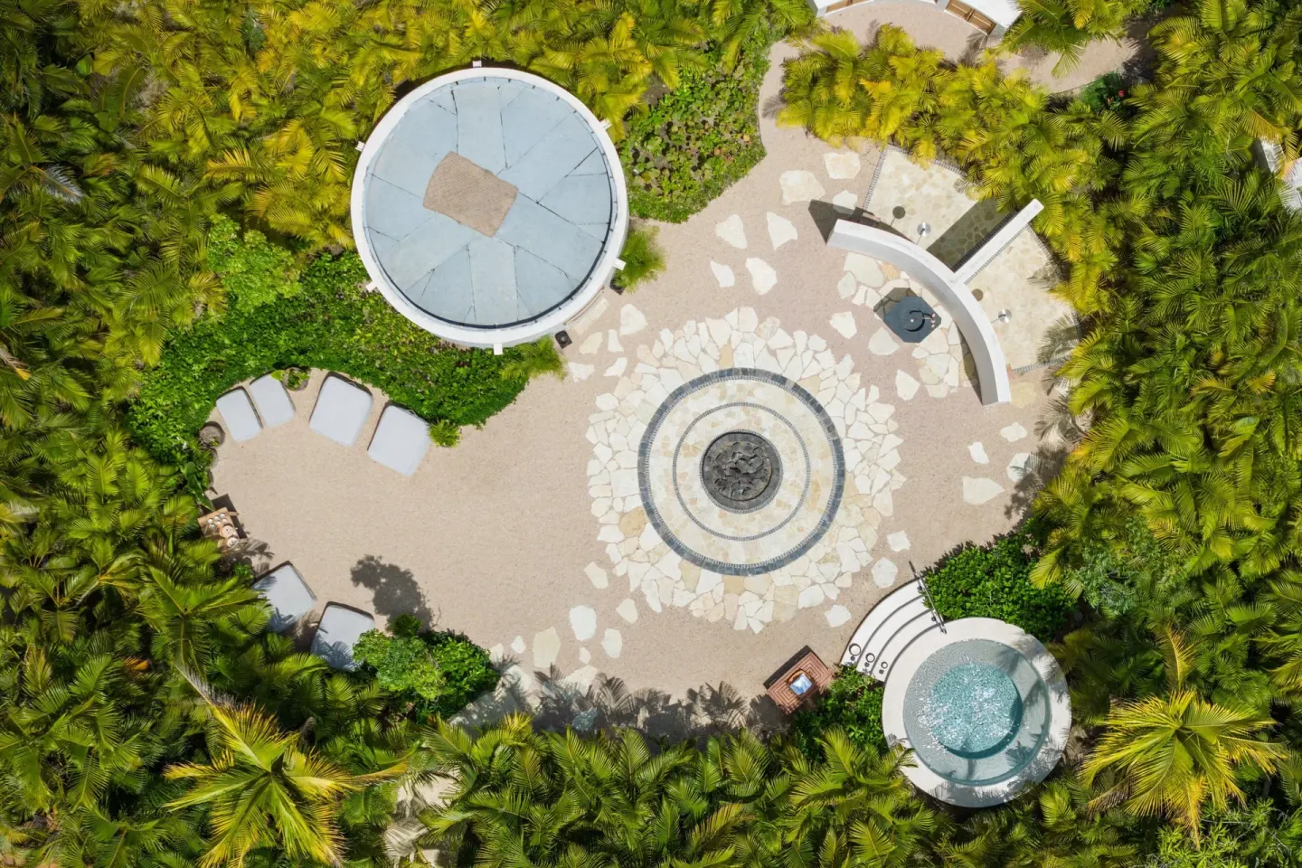 Aerial view of a spa courtyard surrounded by palms at The St. Regis Punta Mita Resort.