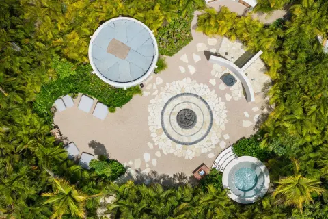 Aerial view of a spa courtyard surrounded by palms at The St. Regis Punta Mita Resort.