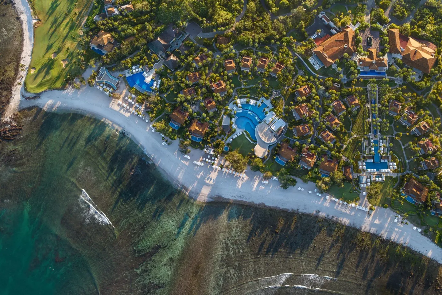 High aerial view of the beachfront resort grounds at The St. Regis Punta Mita Resort.
