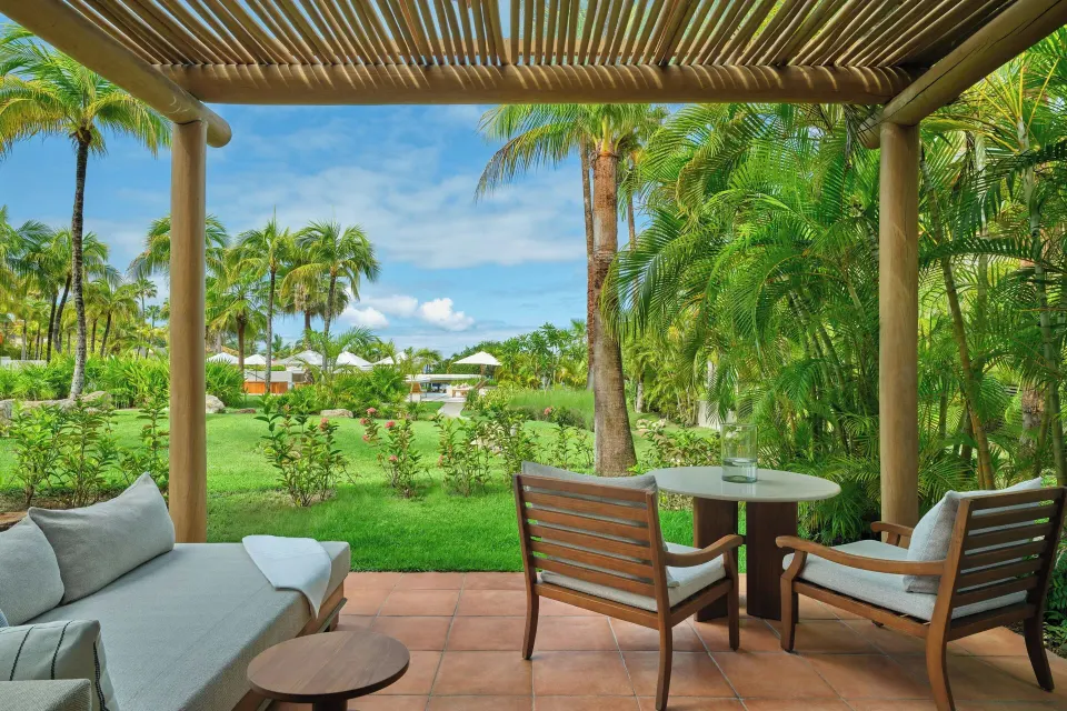Junior Suite Garden View terrace with lounge seating at The St. Regis Punta Mita Resort.