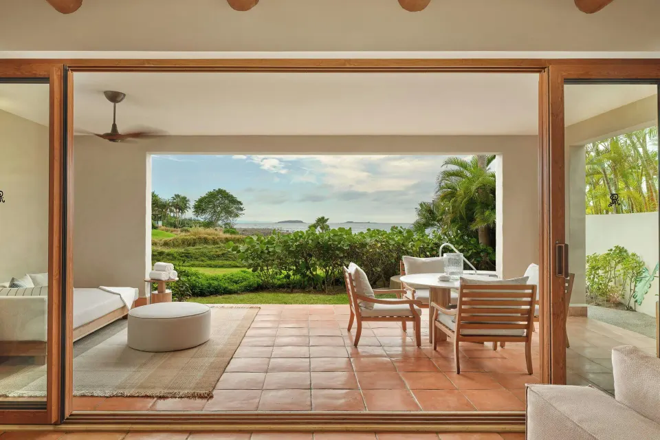 Covered terrace and garden view from a suite at The St. Regis Punta Mita Resort.