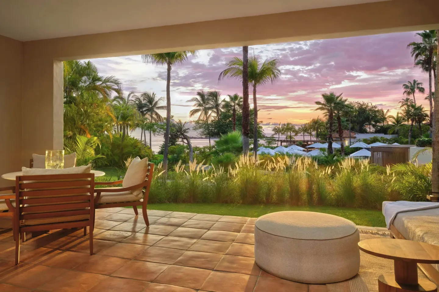 Ocean-view suite terrace with lounge seating at The St. Regis Punta Mita Resort.