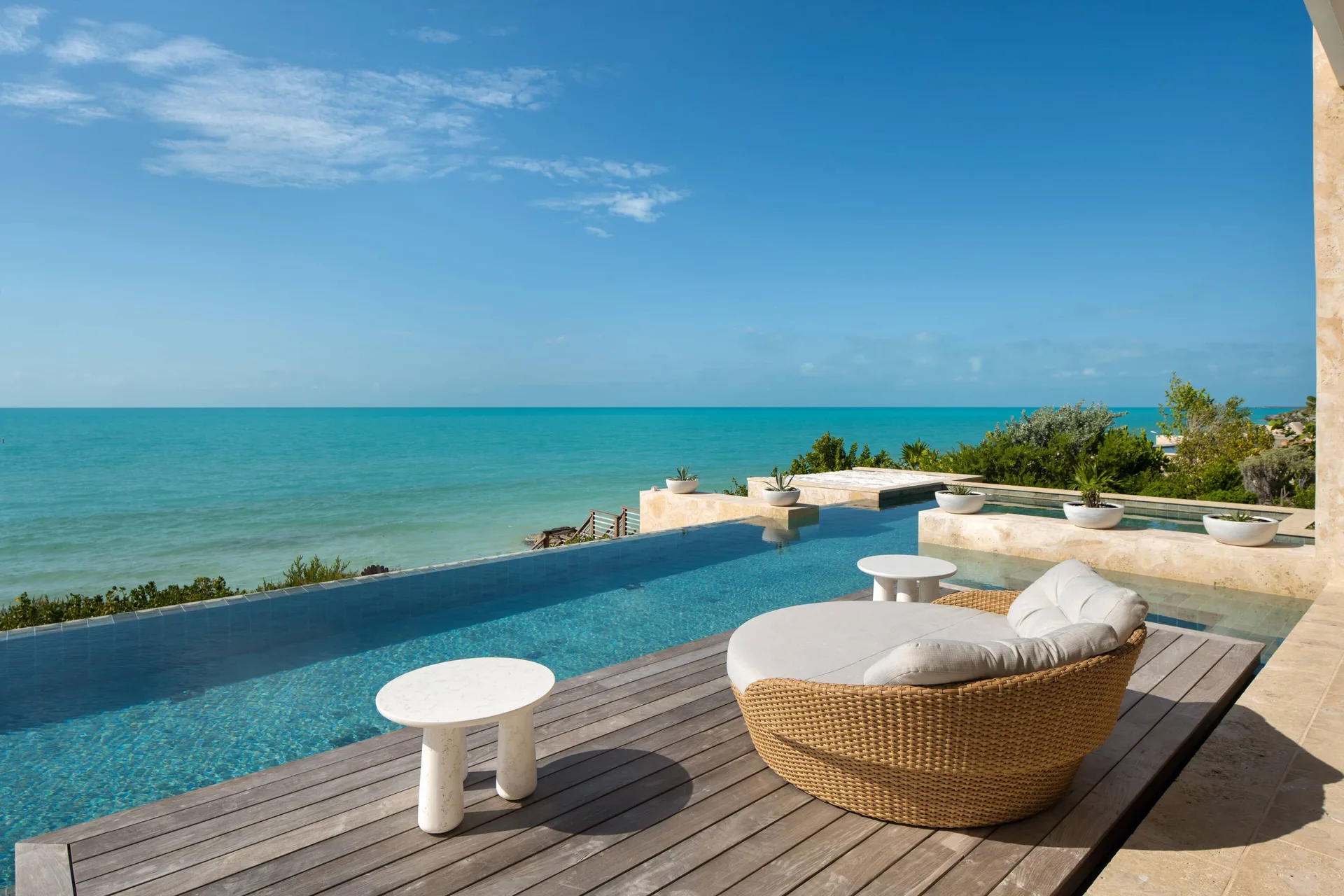 Oceanfront pool terrace at the 6-Bedroom Grand Residence at The Strand Turks and Caicos.