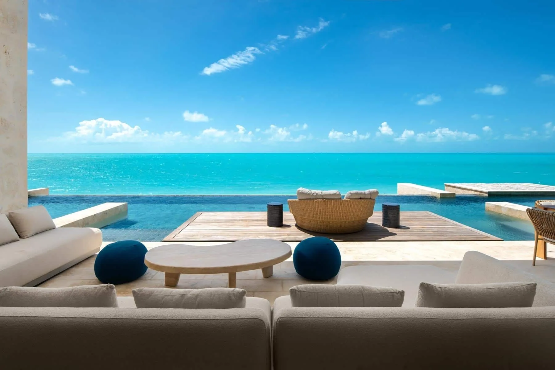 Pool terrace lounge facing the ocean at The Strand Turks and Caicos.
