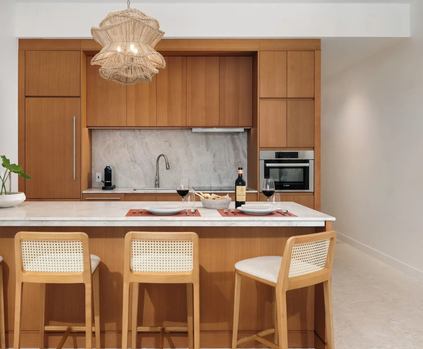 One-bedroom suite kitchen island set for two at The Strand Turks and Caicos.