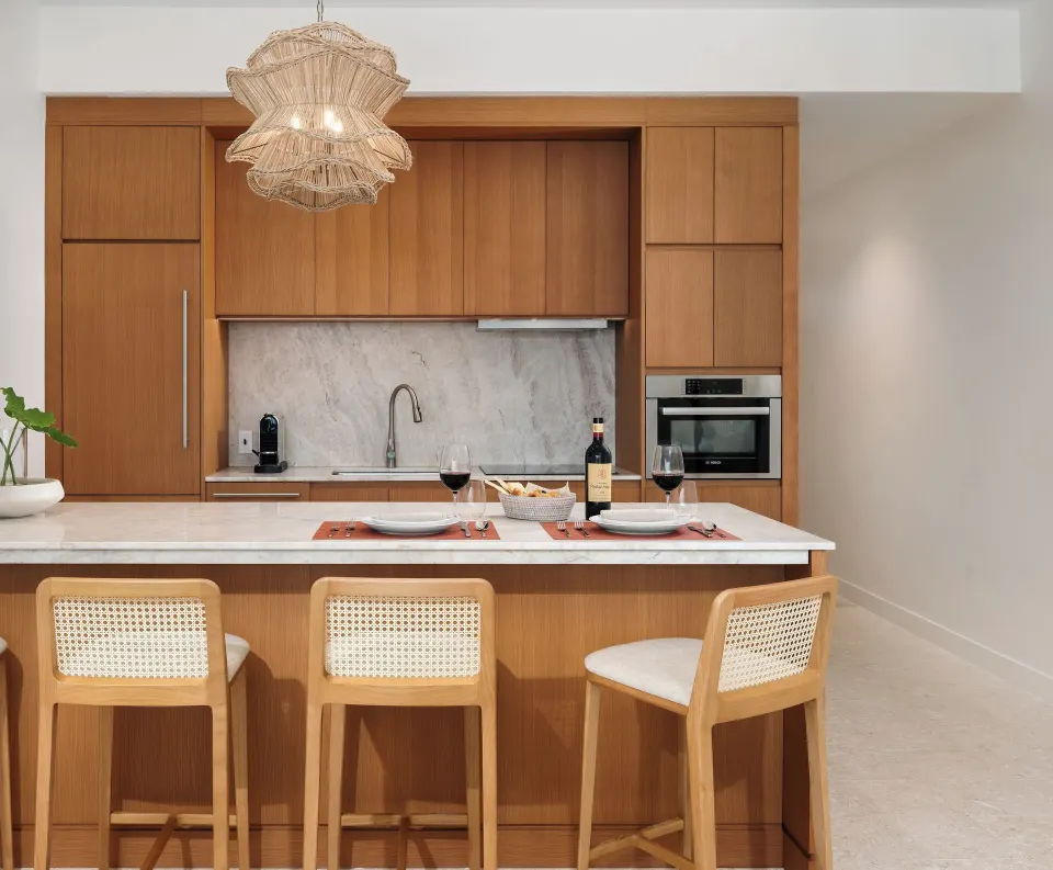 One-bedroom suite kitchen island set for two at The Strand Turks and Caicos.