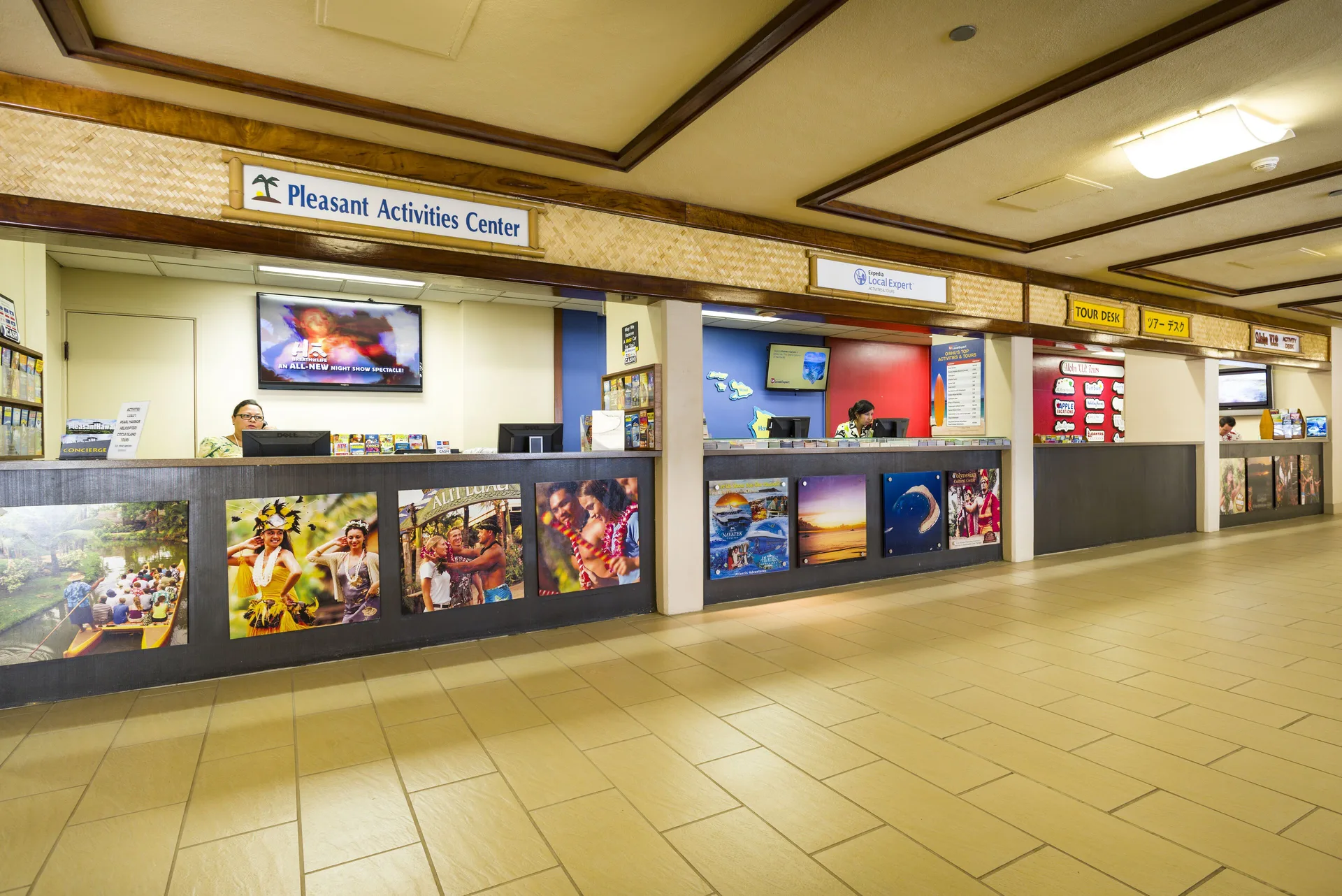 Activity and tour desk counters inside The Twin Fin Hotel.