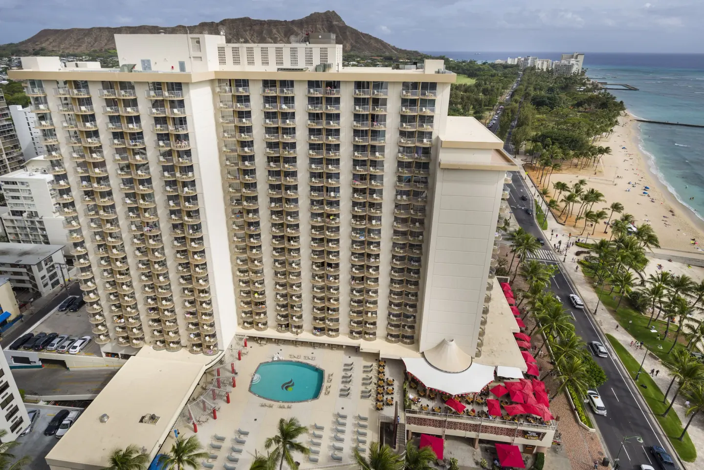 Aerial view of The Twin Fin Hotel beside Waikiki Beach and Diamond Head.