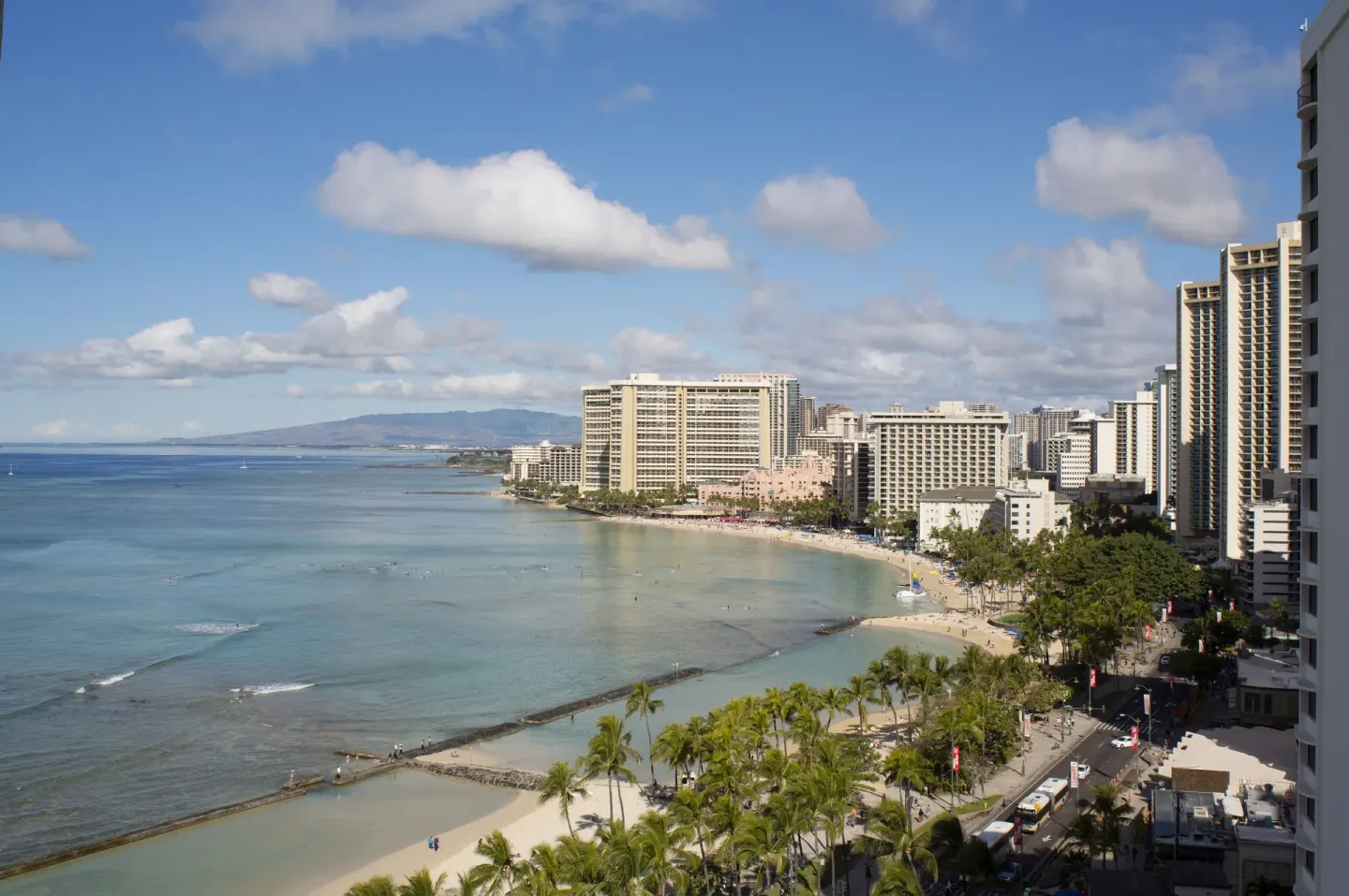 Waikiki shoreline with hotels, beach, and calm water from The Twin Fin Hotel.