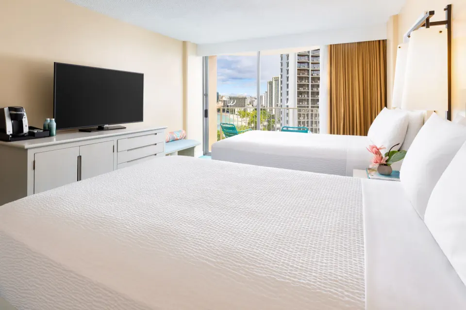 Two-bed ocean view room with balcony at The Twin Fin Hotel.