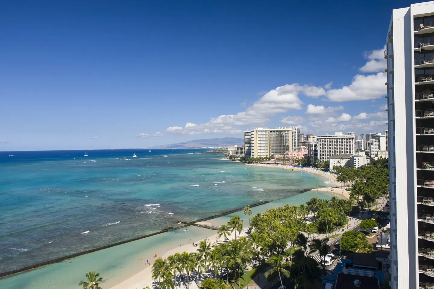 Ocean view over Waikiki Beach from a room at The Twin Fin Hotel.