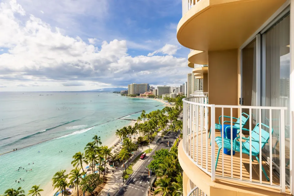 Curved lanai overlooking Waikiki Beach from The Twin Fin Hotel.
