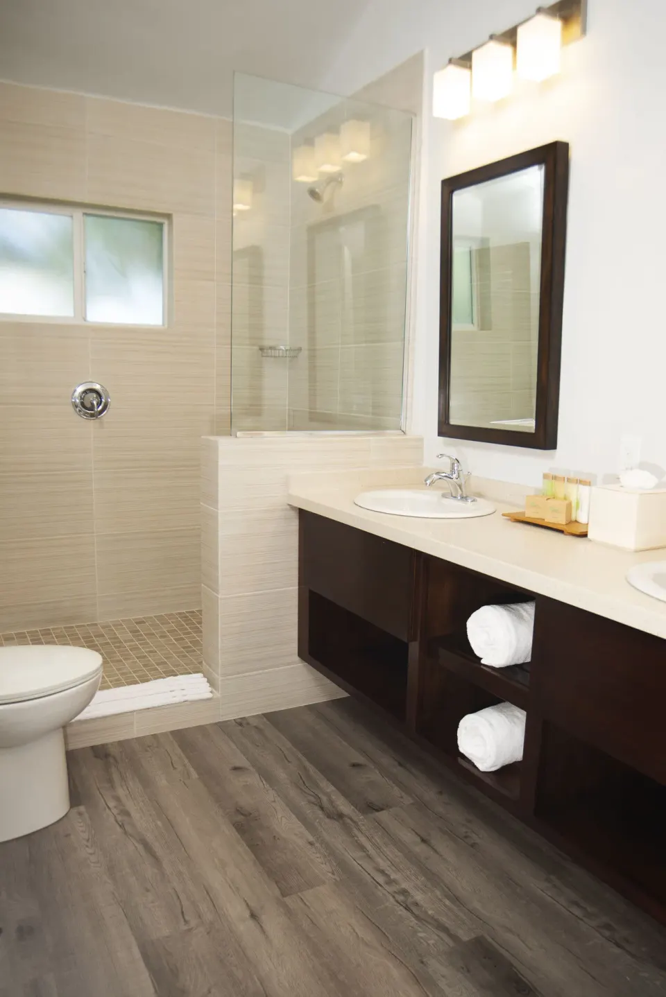 Hillside Suite bathroom vanity and glass shower at The Verandah Antigua.