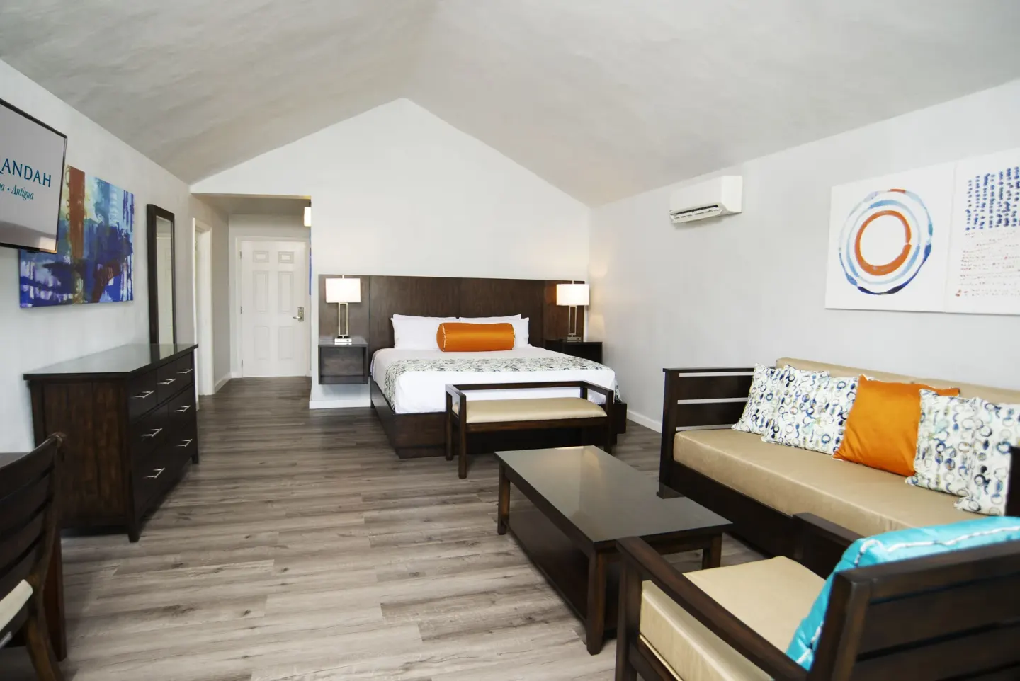 Hillside Suite bedroom and sitting area at The Verandah Antigua.