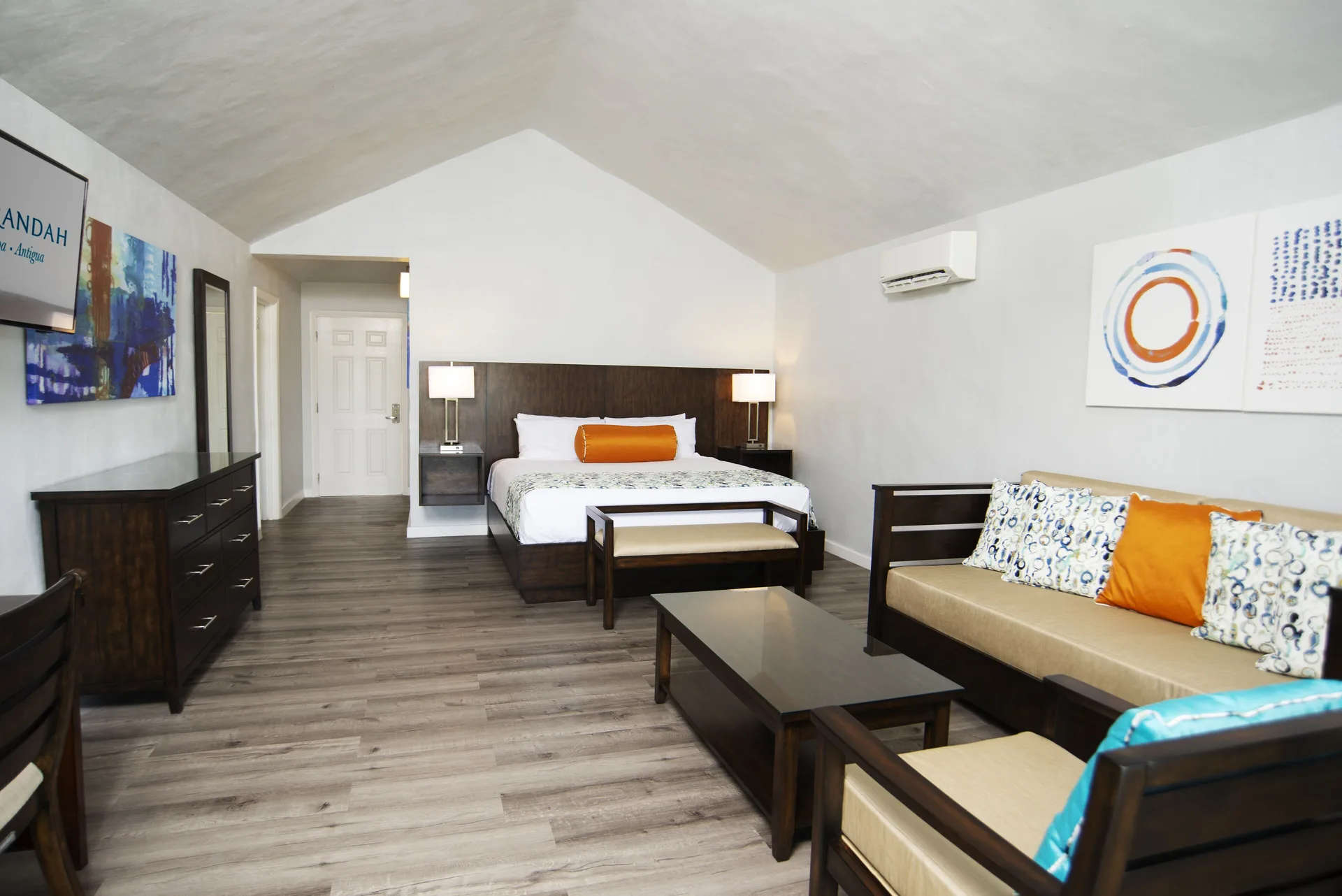 Hillside Suite bedroom and sitting area at The Verandah Antigua.
