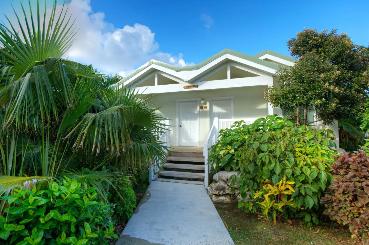Waterview Suite exterior with tropical walkway at The Verandah Antigua.