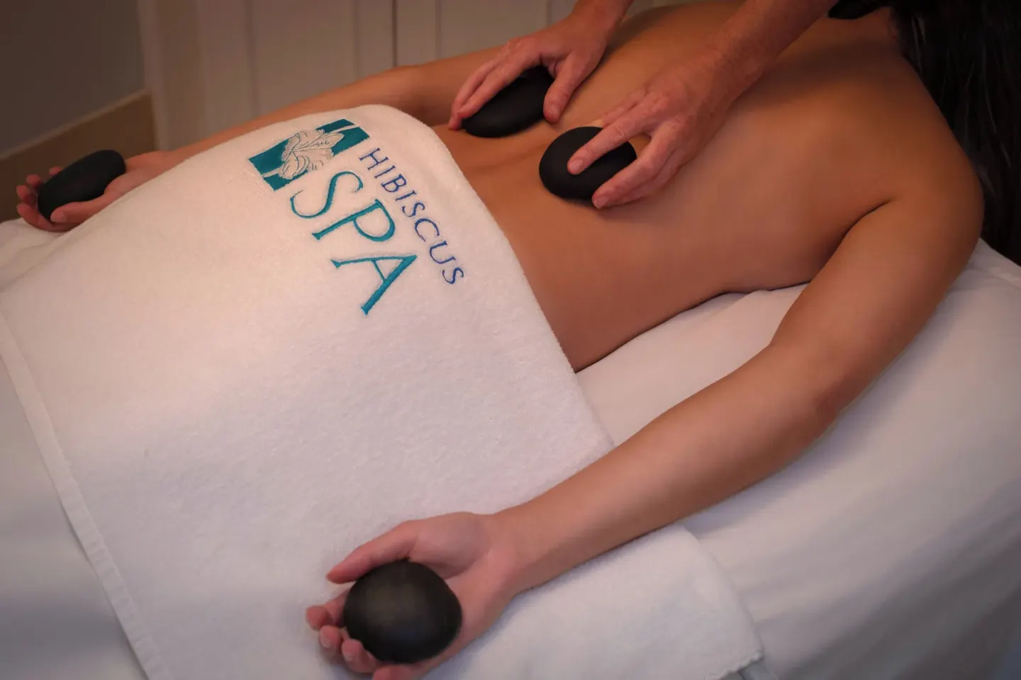 Hot stone massage at The Westin Grand Cayman Seven Mile Beach Resort & Spa.
