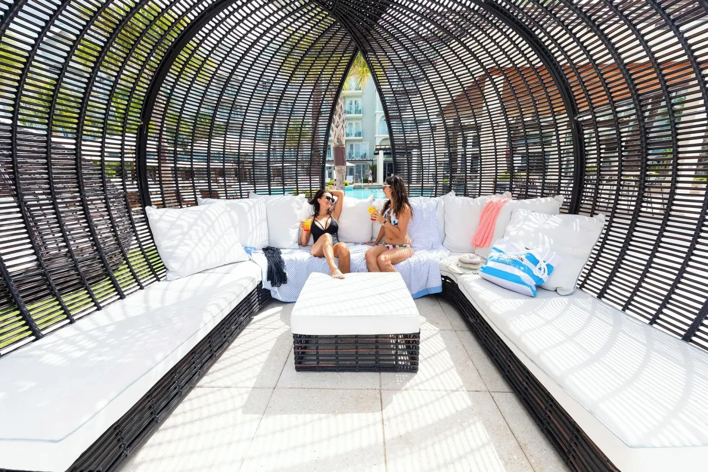 Shaded wicker lounge cabana at The Westin Grand Cayman Seven Mile Beach Resort & Spa.