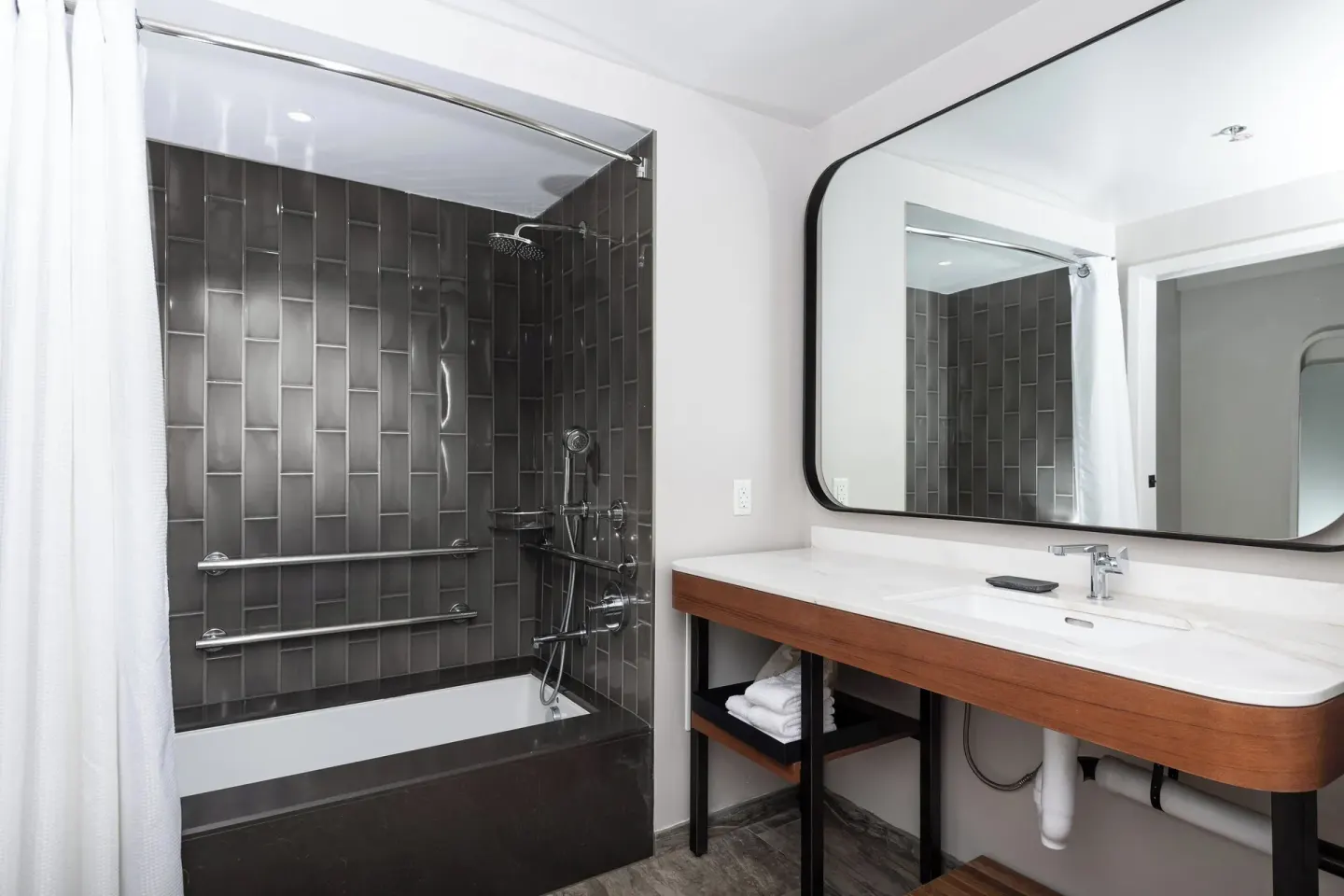 Guest bathroom with tub-shower and vanity at The Westin Maui Resort & Spa, Ka'anapali.