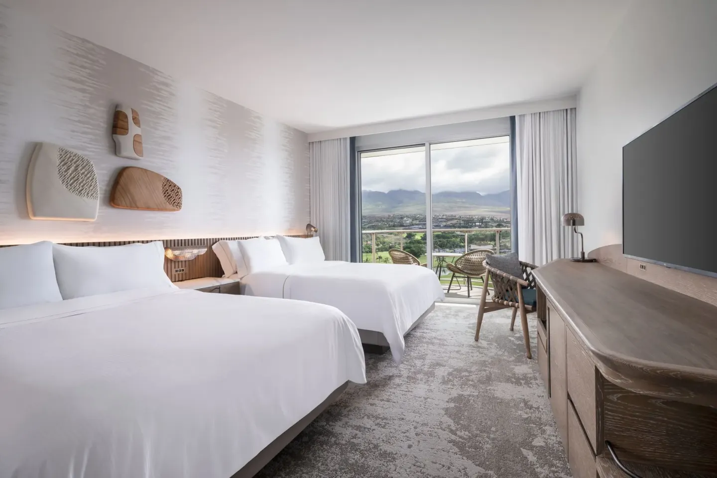 Two-bed guest room with mountain-view balcony at The Westin Maui Resort & Spa, Ka'anapali.