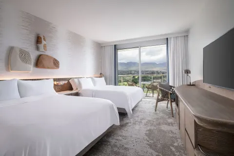 Two-bed guest room with mountain-view balcony at The Westin Maui Resort & Spa, Ka'anapali.