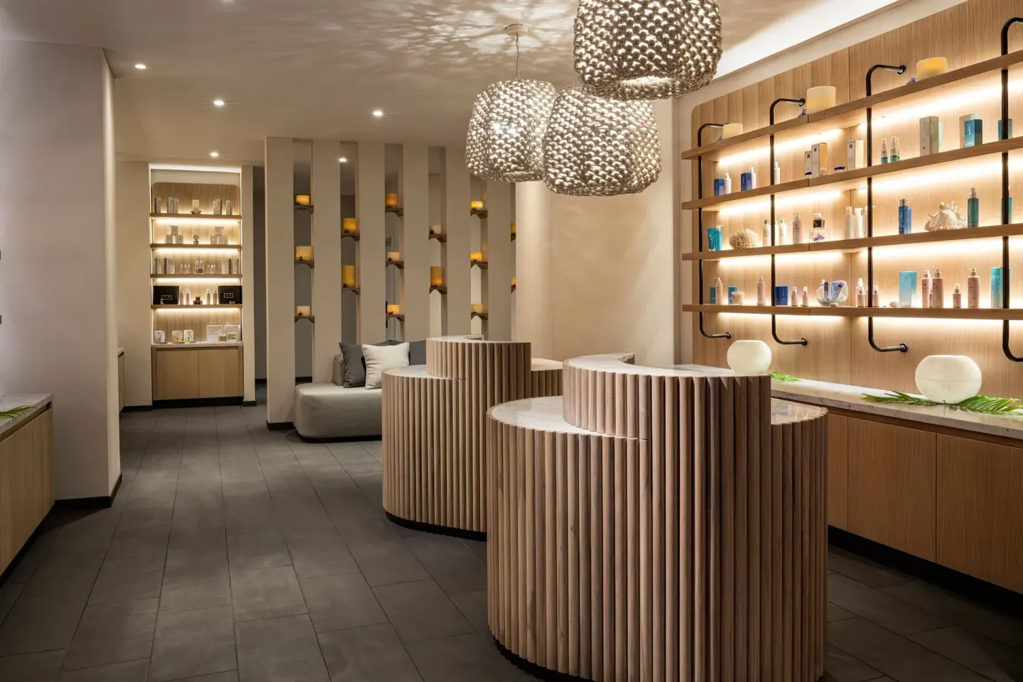 Spa retail room with lit shelves and round displays at The Westin Maui Resort & Spa, Ka'anapali.
