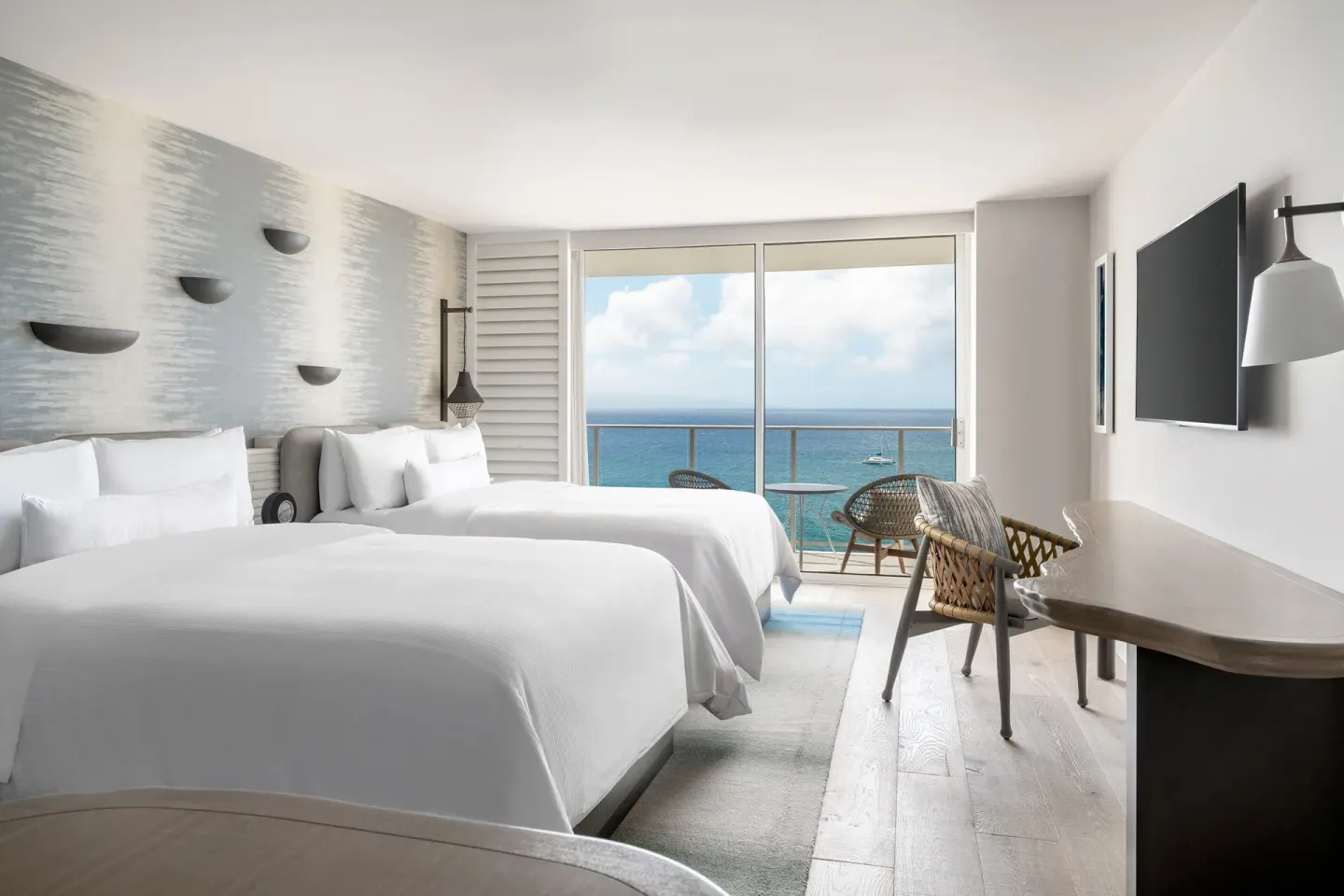 Two-bed oceanfront guest room with balcony at The Westin Maui Resort & Spa, Ka'anapali.