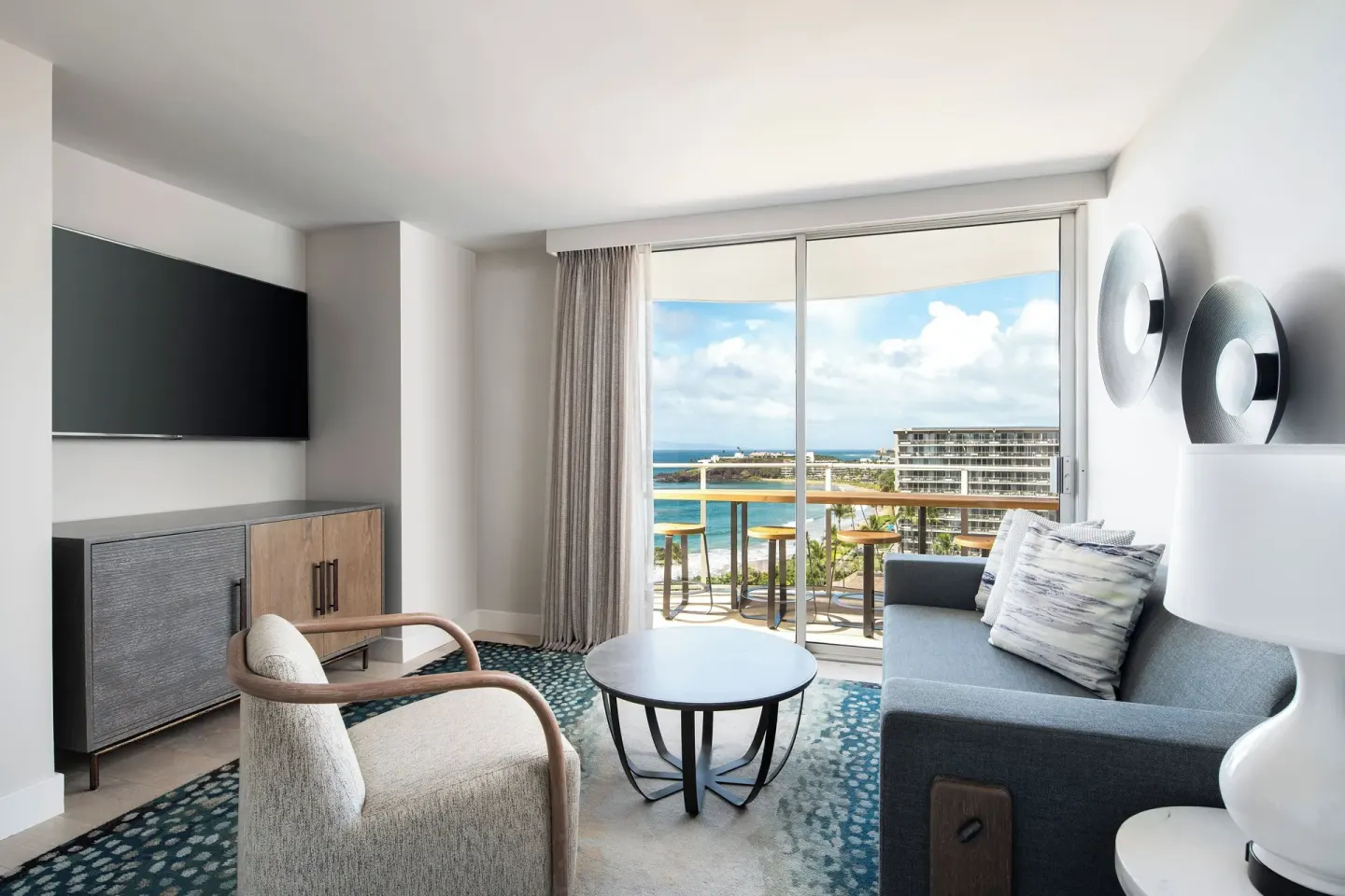 Ocean-view suite living room with balcony at The Westin Maui Resort & Spa, Ka'anapali.