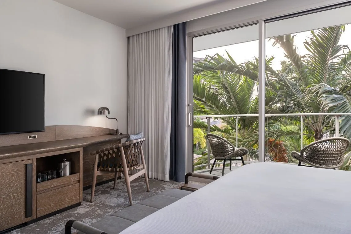 Premium Resort View room with desk, king bed, and palm-facing balcony at The Westin Maui Resort & Spa, Ka'anapali.