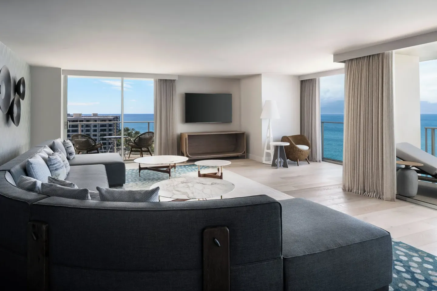 Presidential suite living room with ocean-view windows at The Westin Maui Resort & Spa, Ka'anapali.