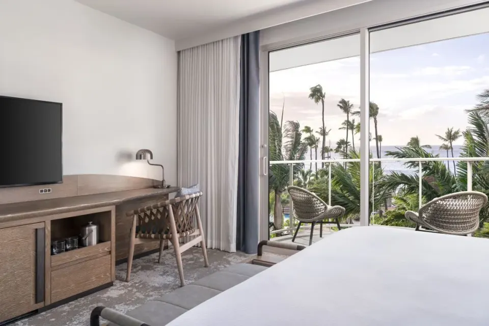 King guest room desk and balcony with ocean view at The Westin Maui Resort & Spa, Ka'anapali.