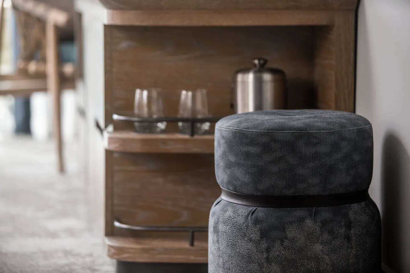 Refreshment cabinet and upholstered stool in a guest room at The Westin Maui Resort & Spa, Ka'anapali.