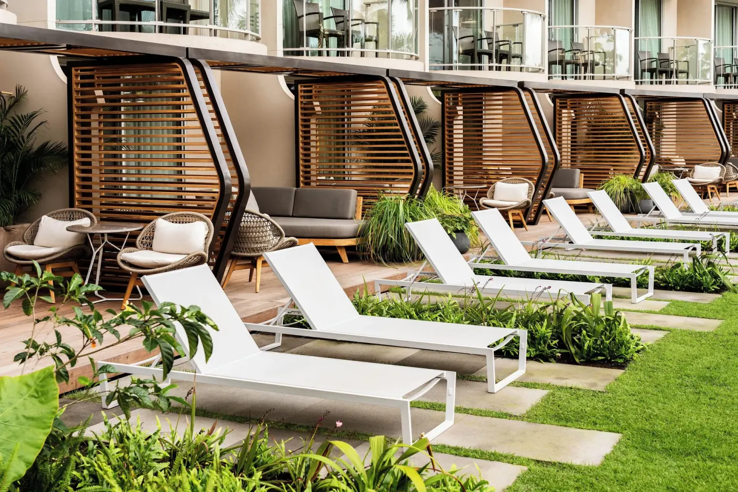 Kūkahi Sundeck room patios with loungers at The Westin Maui Resort & Spa, Ka'anapali.