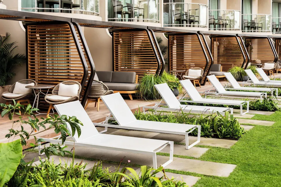 Kūkahi Sundeck room patios with loungers at The Westin Maui Resort & Spa, Ka'anapali.