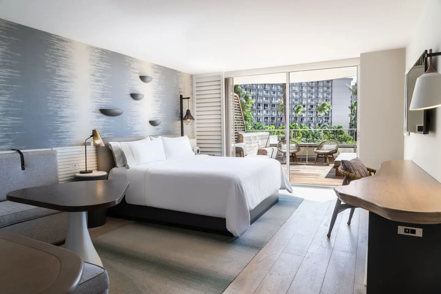King-bed Hokupa'a Tower guest room with furnished lanai at The Westin Maui Resort & Spa, Ka'anapali.