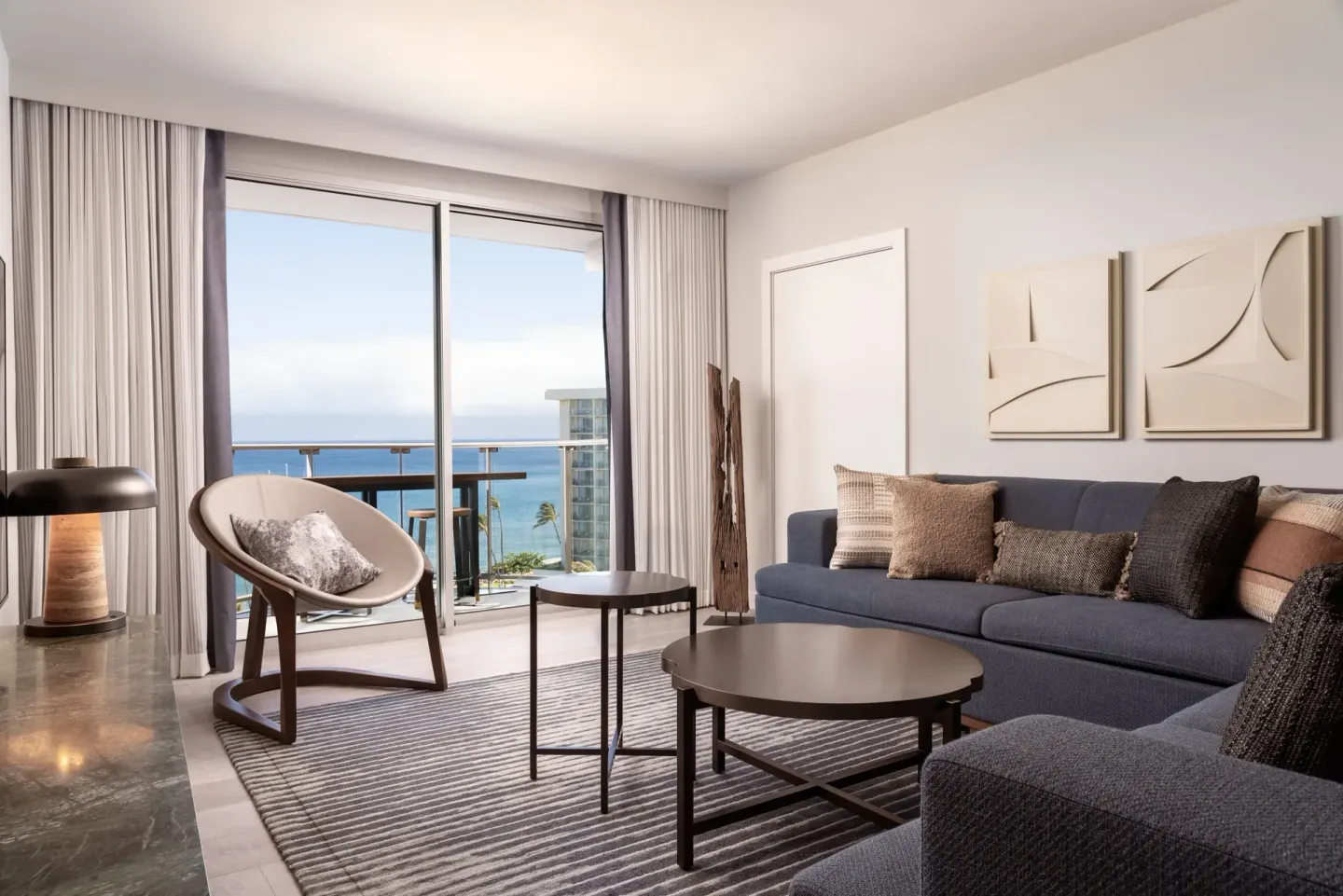 Kukahi Suite living room with ocean-view balcony at The Westin Maui Resort & Spa, Ka'anapali.
