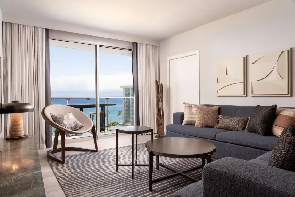 Kukahi Suite living room with ocean-view balcony at The Westin Maui Resort & Spa, Ka'anapali.
