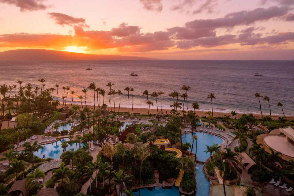 Sunset ocean view from The Westin Maui Resort & Spa, Ka'anapali above pools, palms, and the beach.