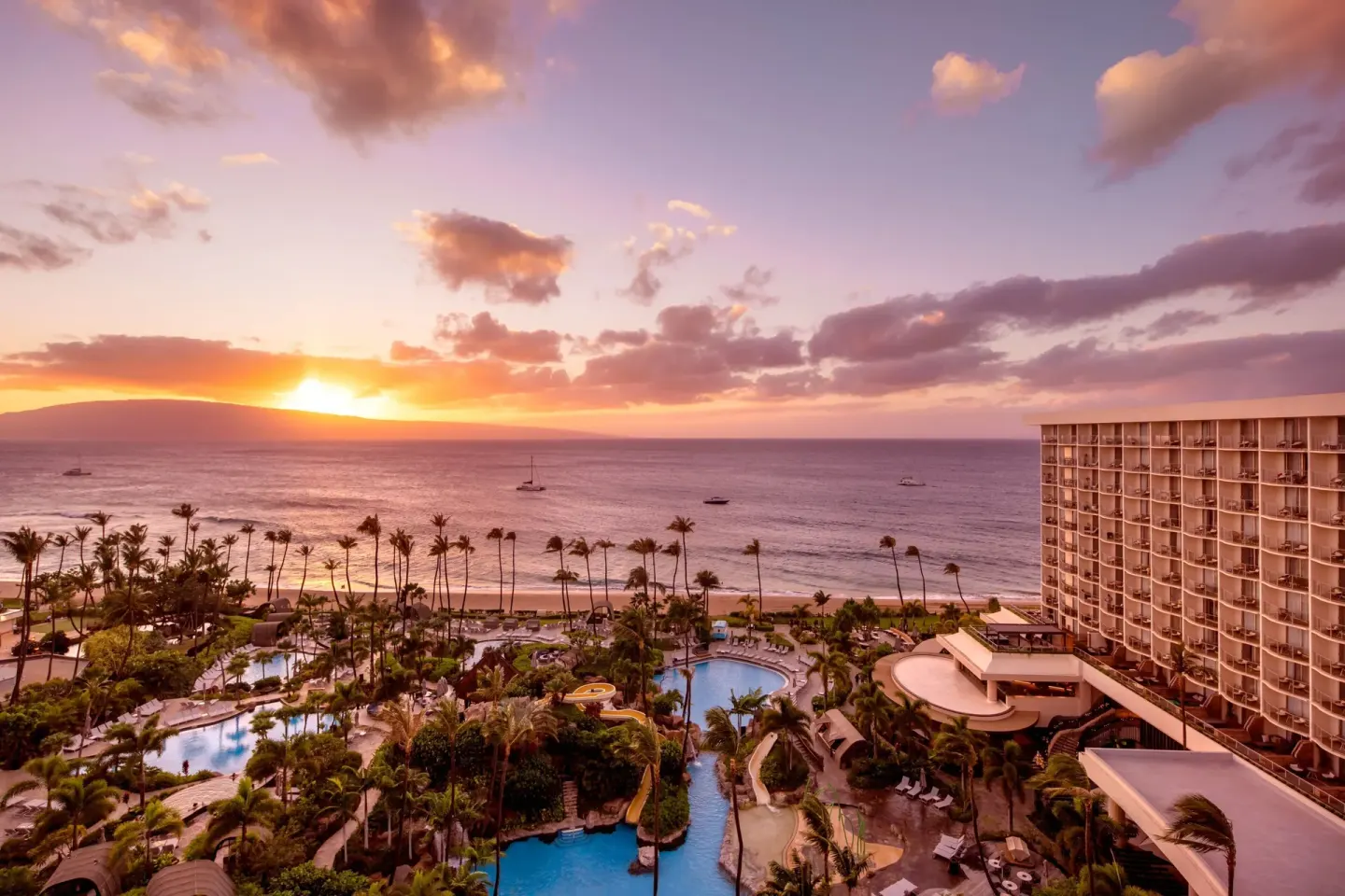 Oceanfront sunset view from The Westin Maui Resort & Spa, Ka'anapali with pools, palms, and beach.