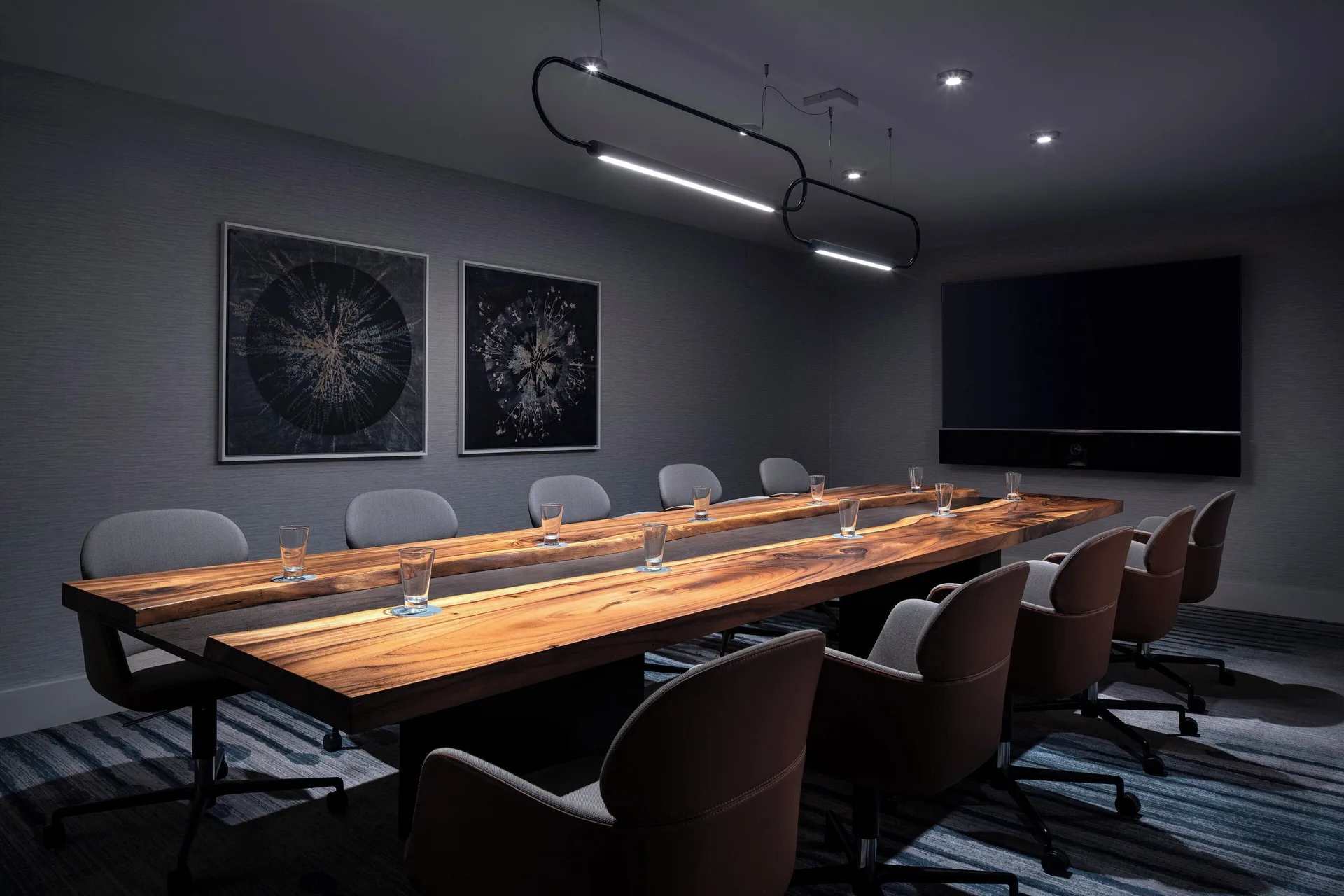 Boardroom at The Westin Maui Resort & Spa, Ka'anapali with a long wood table and wall display.