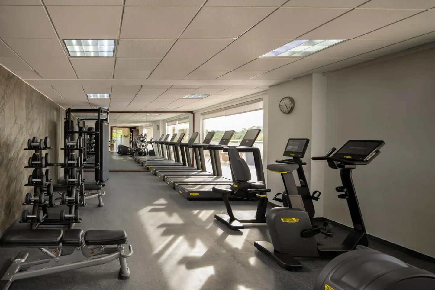 Fitness center cardio machines and weights at The Westin Puntacana Resort.