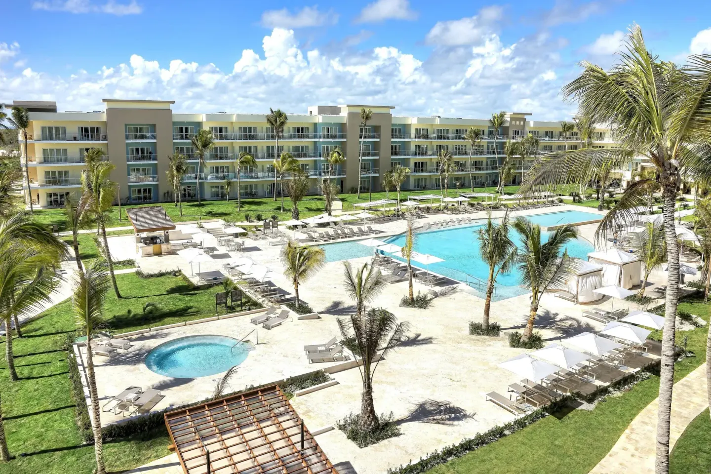 Main pool deck and resort buildings at The Westin Puntacana Resort.
