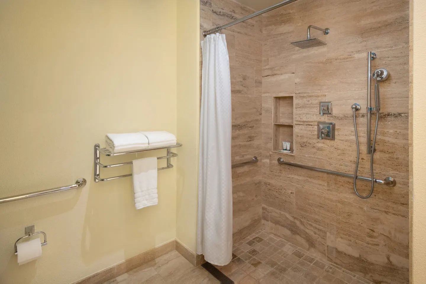 Traditional Room Ocean View shower with tiled walls and handheld sprayer at The Westin Puntacana Resort.