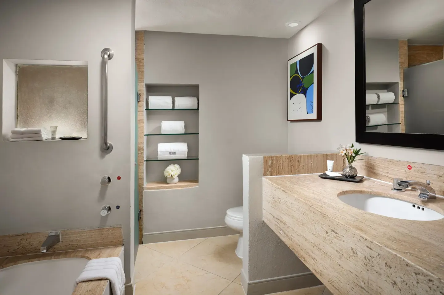 Bathroom with sink, shower area, and towel shelves at The Westin Resort & Spa, Cancun.