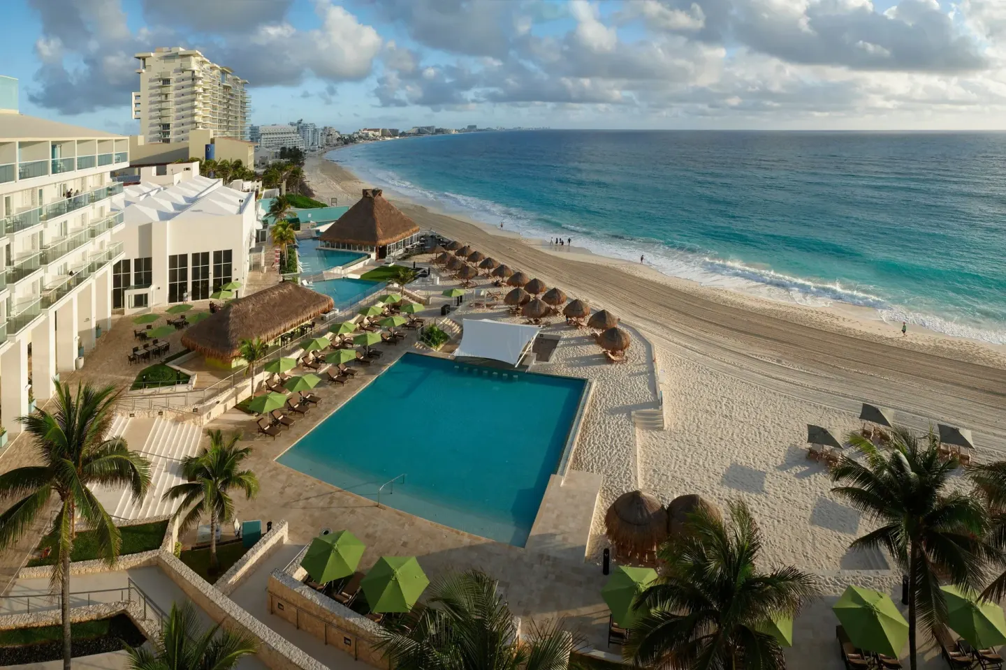 Aerial view of the beachfront pool and Caribbean Sea at The Westin Resort & Spa, Cancun.