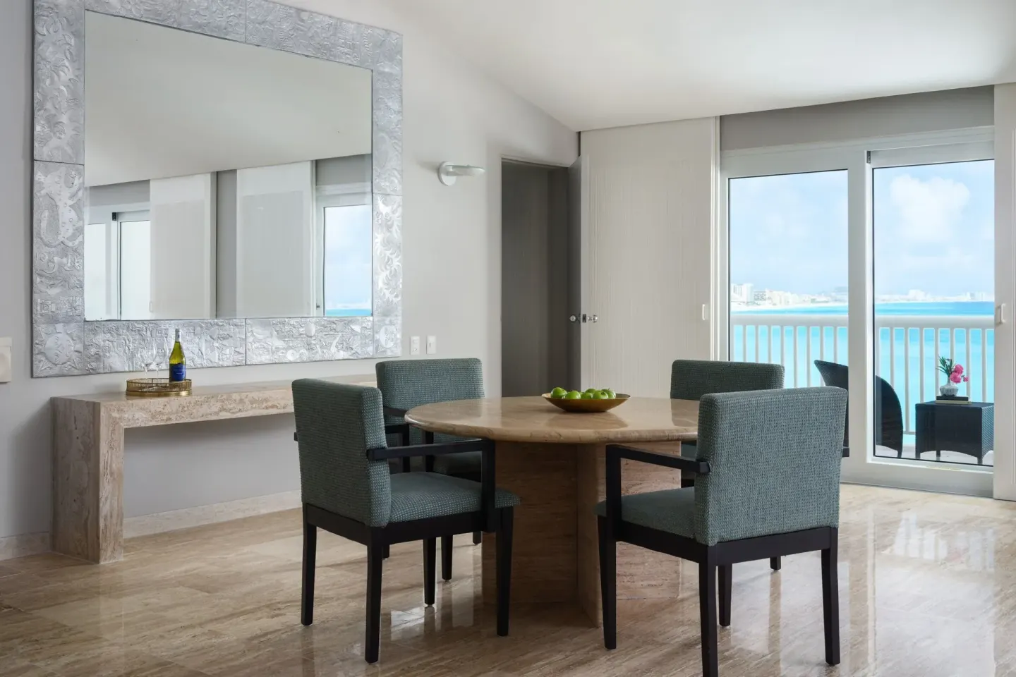 Suite dining table and balcony view at The Westin Resort & Spa, Cancun.