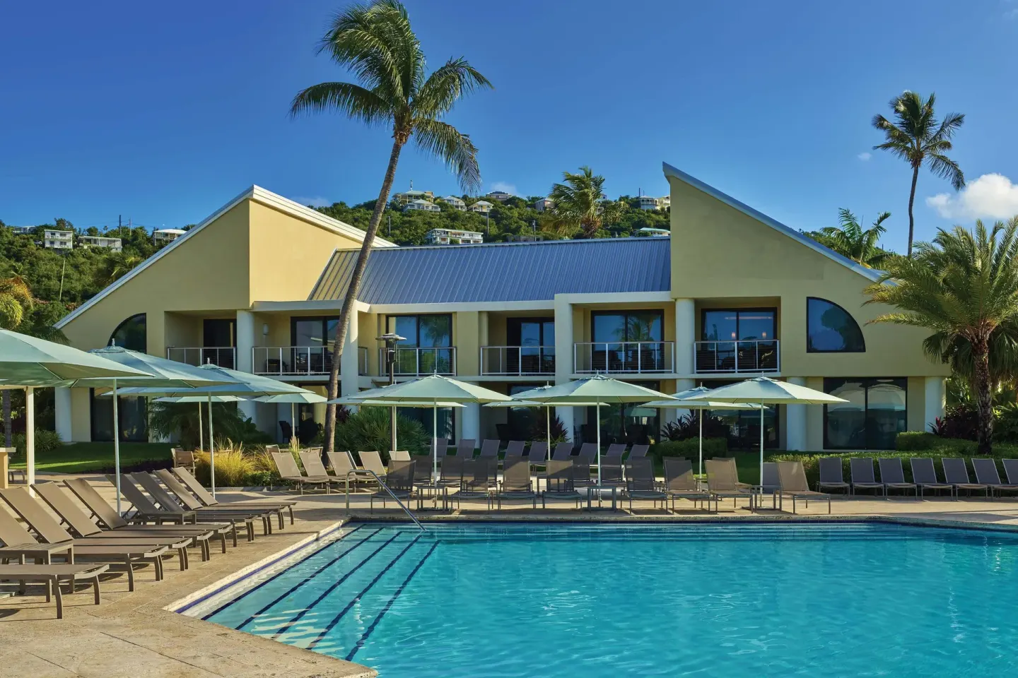 Pool deck and villa buildings at The Westin St. John Resort Villas.
