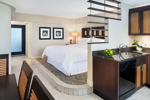Villa bedroom with king bed and kitchenette at The Westin St. John Resort Villas.