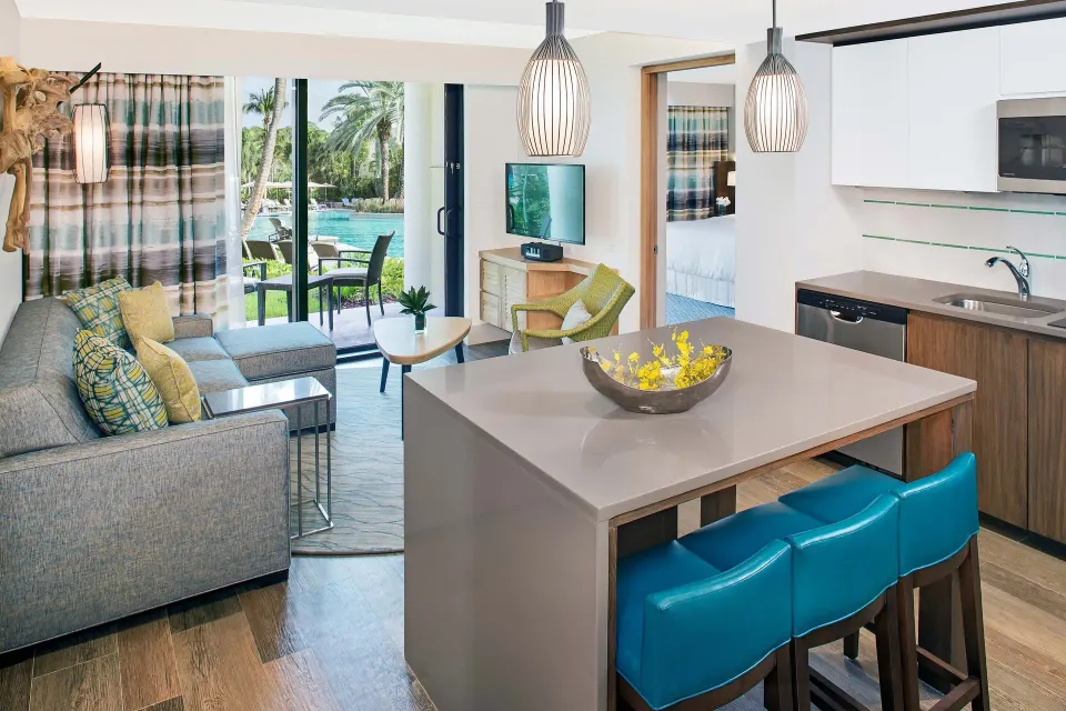 Villa living area with kitchenette and patio doors at The Westin St. John Resort Villas.